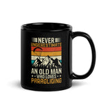 Never Underestimate and Old Man Who Loves Paragliding Black Glossy Mug