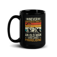 Never Underestimate and Old Man Who Loves Paragliding Black Glossy Mug