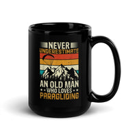 Never Underestimate and Old Man Who Loves Paragliding Black Glossy Mug