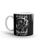 We Keep Evil Awake at Night White glossy mug