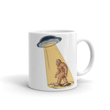 Abducting Bigfoot White glossy mug