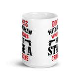 Don't Mess with a Woman Who Knows... White glossy mug