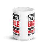 Riding a Bicycle White glossy mug