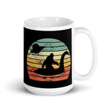 Bigfoot Riding Nessie White glossy mug